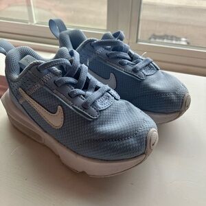 Little girls light blue Nike shoes. Size 8C